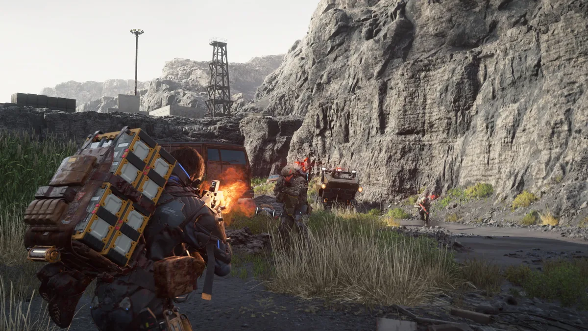 In-game screenshot of Death Stranding 2: On the Beach showing an outdoor environment